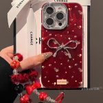 Elevate your phone game with the Glitter Bow iPhone Case. Designed with a glossy shimmer finish and delicate floral accents, this case features a standout 3D metallic bow that adds charm and sophistication. It provides full protection while staying lightweight and compatible with wireless charging. Ideal for style lovers who appreciate both fashion and function. Features: Glossy shimmer surface with floral detailing 3D metallic bow centerpiece Shock-absorbent TPU for drop protection Slim, stylish, and wireless charging friendly A perfect blend of cute and classy for everyday use